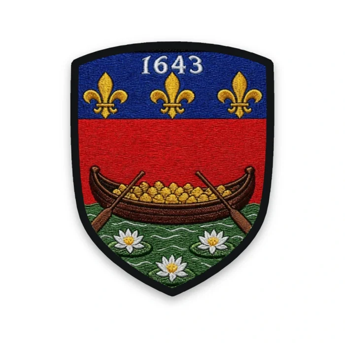 Écusson de la Guyane brodé – pirogue chargée d'or sur le fleuve et chef de lys daté 1643